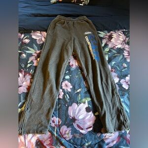 A4 small grey school athletic sweatpants. Well used but in good condition.